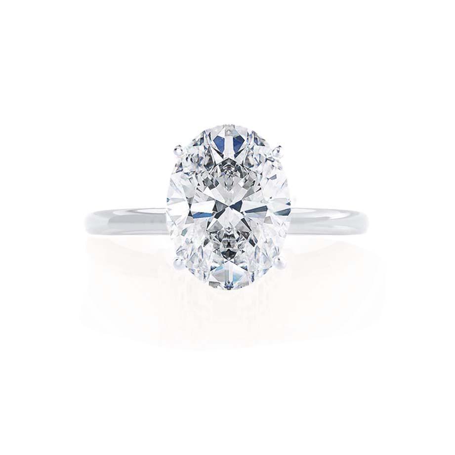 0.2 CT Oval Solitaire CVD E/VVS1 Diamond Engagement Ring